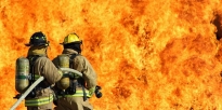 U.S. Army Firefighters putting out a fire. 