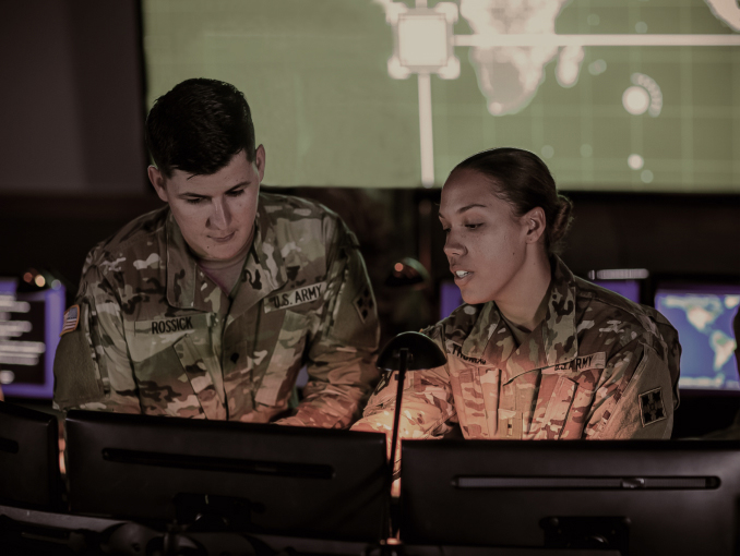Army Cyber Soldiers in front of computers, working inside a Cyber center
