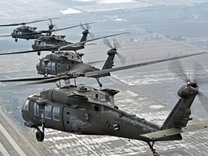 Black Hawk helicopters flying in formation