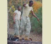 Cadets learn how to keep balance and gain confidence on the log walk
