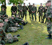 LTC Trittipo gives the cadets some instruction on the finer points of Land Navigation.