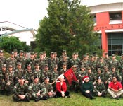 The Florida Southern College Moccasin Battalion poses for a Christmas picture.
