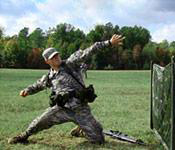 Cadets practice throwing a hand grenade.