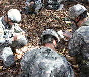 Senior Cadets provide assistance in training the Junior Cadets on basic tactical operations.