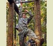 ROTC will show you how to overcome your physical and mental limits. This Cadet is pushing through a rigorous obstacle course at Camp Ripley MN during Fall FTX.