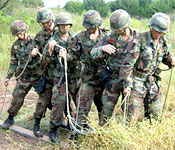 The Leader’s Reaction Course is designed to put cadets in unique and challenging situations. The leader must take charge of a group of cadets and complete the task within a given period of time. Cadets are often put in these situations in order to develop their leadership skills and build teamwork within the ROTC Battalion.