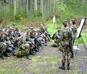 CDT Bolos briefs the PLU Lute Battalion on leadership training safety.