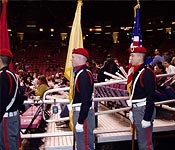 Cadets have a variety of extra curricular groups and organizations that they can choose to join. Here the Queen’s Guard is rehearsing prior to providing the National Colors at a New Jersey Nets Basketball game.