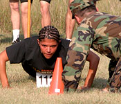 A cadet competes in a Ranger Challenge Competition which involves physical and technical challenges.