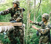Cadets maneuver through tough obstacles and learn about leadership and teamwork on the Field Leadership Reaction Course.