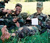 After a long day of training in the field, Cadets take a moment to relax.