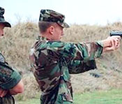 Cadet Jacob S. shoots the 9mm during the marksmanship event of the German Armed Forces Badge for Military Proficiency.