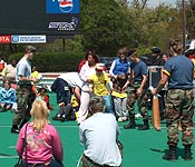 Hopkins ROTC cadets help at a Baltimore Special Olympics event.