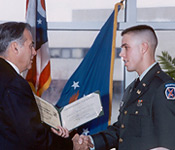 University of Akron President, Dr. Luis Proenza presents the Baccalaureate Degree to a UA Cadet just prior to his commissioning as a 2LT in the United States Army. University of Akron Cadets often receive additional awards upon graduation for their outstanding scholarly achievements.