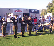 University of Akron Cadets pose with the school cannon at a Zips football game.