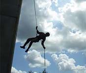 New recruits learn a variety of skills such as rappelling down a high wall.