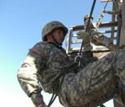 Cadets rappel down a tower during a Field Training Exercise (FTX)