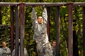 Cadets participate in a Field Training Exercise (FTX) once a semester. Here is a picture of a cadet on the always fun, obstacle course!