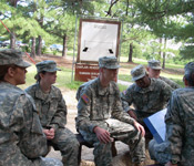 Cadets receive their briefing prior to negotiating the Fit To Win Confidence Course at Fort Jackson, SC.